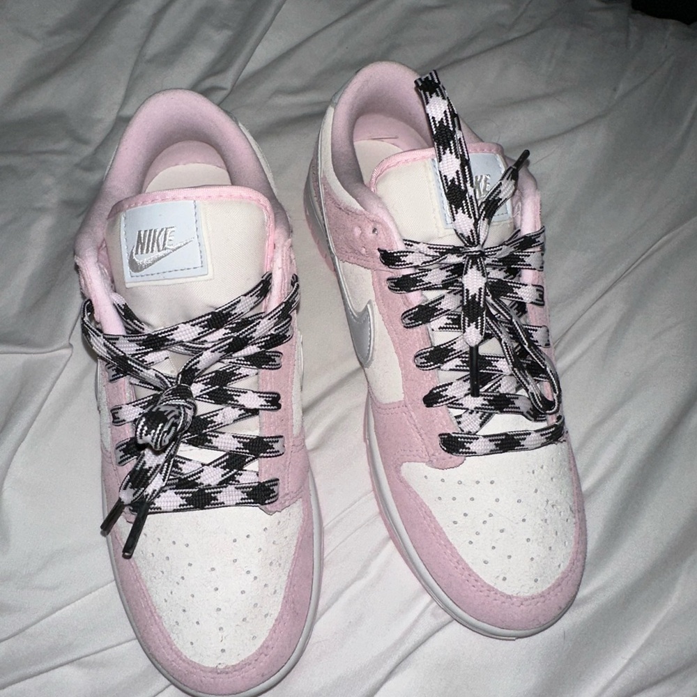 Woman dunks Pink Foam